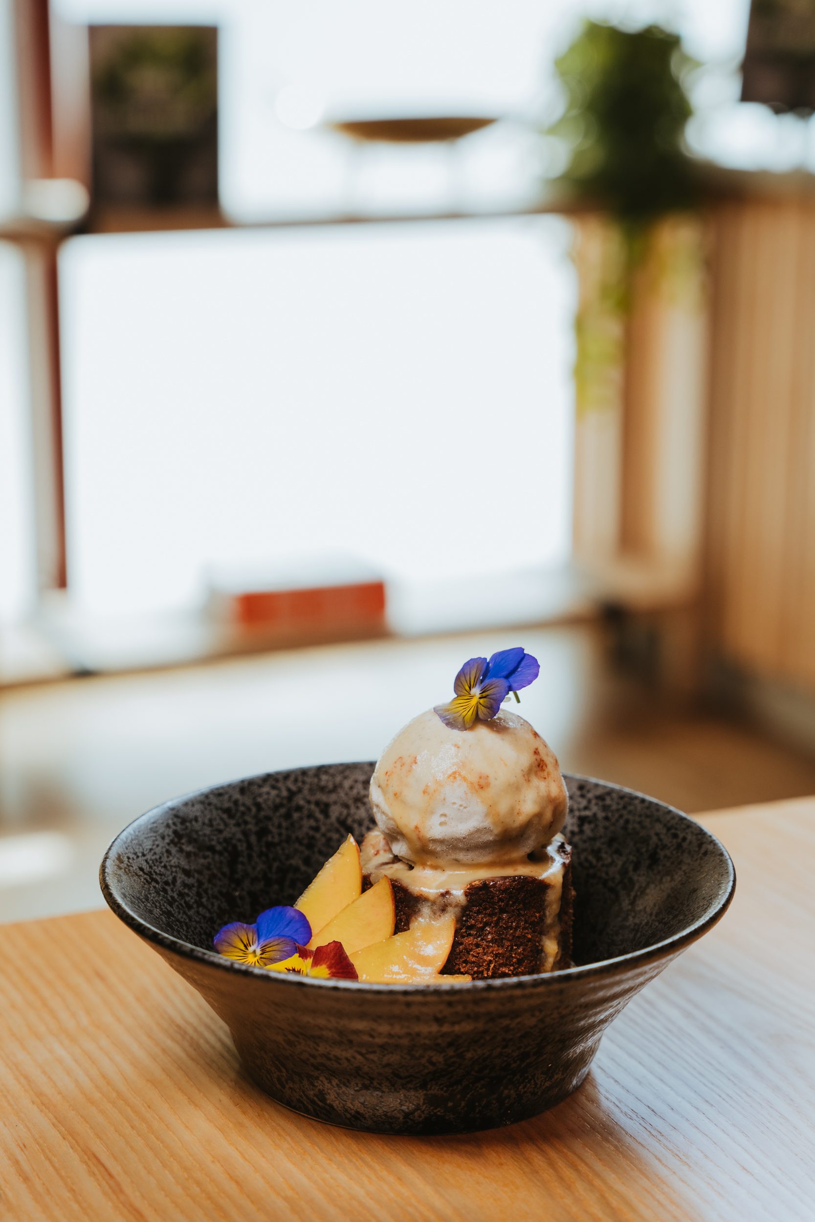 Burma Love Menlo Park — guests at the table beneath pendant lights