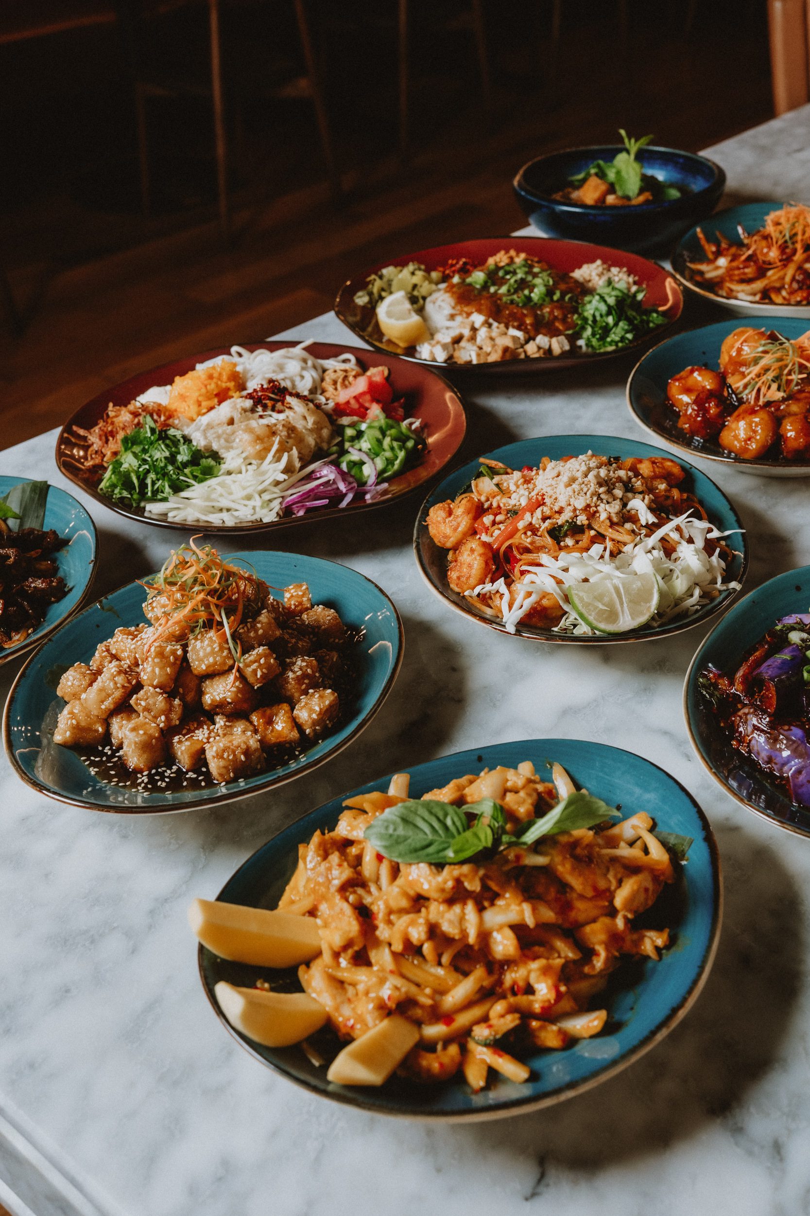 A full table of Burma Superstar dishes