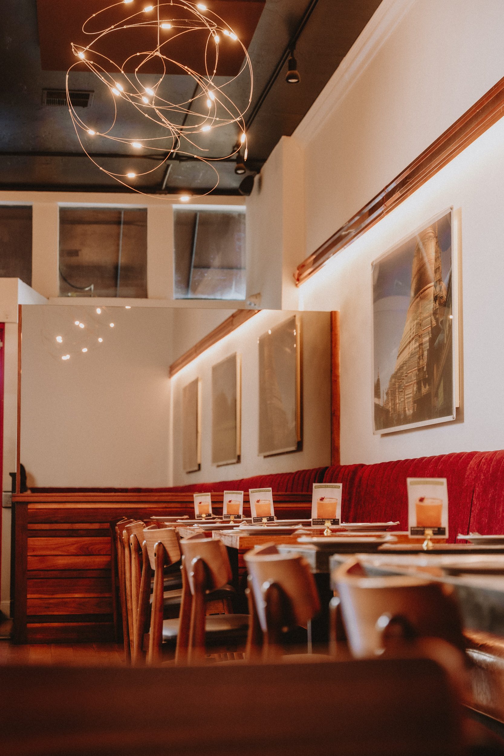 Burma Superstar Oakland — warm dining room and bar on Telegraph Avenue